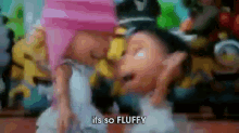 a blurry picture of a person dancing with the words `` it 's so fluffy '' written in the corner .