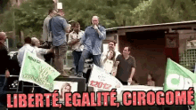 a man stands on top of a truck speaking into a microphone with the words liberte egalite cirogome written below him