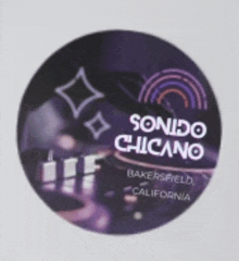 a purple circle with the words sonido chicano bakersfield california on it