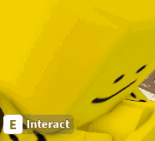 a close up of a yellow smiley face with e interact written on the bottom