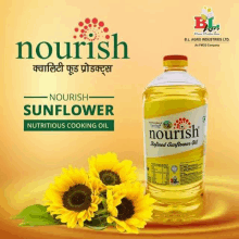 a bottle of nourish sunflower oil is sitting next to a sunflower .