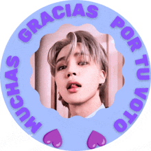 a purple circle with gracias por tu voto written on it