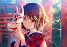 a girl in a kimono is holding a fox mask in front of her face