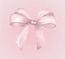 a pink bow on a pink background with a knot in the middle