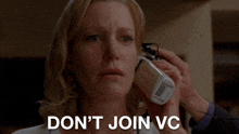 a woman talking on a cell phone with the words " do n't join vc " written below her