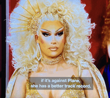 a drag queen says " if it 's against plane she has a better track record .. "