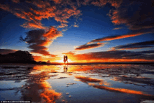 a couple standing on a beach at sunset with the words ben mulder caters news in the bottom right corner