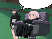 a girl with pink hair is sitting in a chair with a speech bubble above her head ..