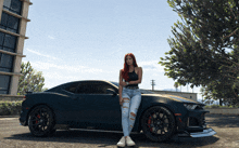 a woman leans against a black car with a red tire on it