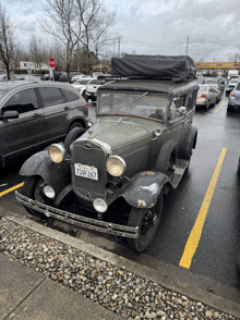 an old car with a license plate that says 150f267