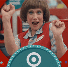 a woman in a target uniform with a name tag that says megan e. smith