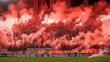 a soccer stadium with a banner that says vodafone