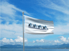 a white flag with the word avatar on it is waving in the wind