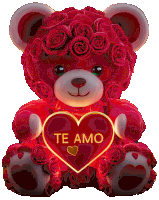 a teddy bear with roses on its head is holding a red heart that says te amo