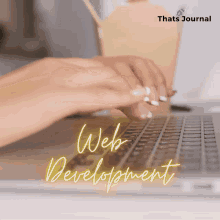 a person is typing on a laptop with the words web development written on the bottom