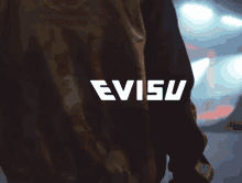 the word evisu is on the back of a person 's shirt