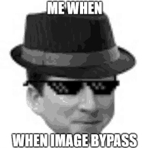 a man wearing a hat and sunglasses with the words `` me when when image bypass '' written on it .