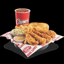 a cane 's chicken fingers meal with coleslaw french fries and a drink