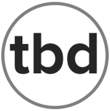 a black and white logo for tbd in a circle