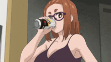 a woman with glasses is drinking from a can that says " coca cola " on it