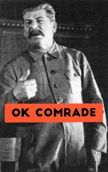 a black and white photo of a man giving a thumbs up with ok comrade written in orange