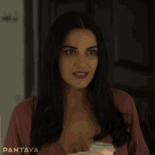 a close up of a woman 's face with the word pantaya in the corner