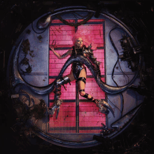 a woman with pink hair is laying on a circular platform