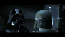 darth vader and boba fett are looking at each other in a dark room