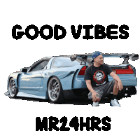 a man is sitting in front of a car with the words good vibes mr24hrs