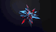 a blue and red star shaped object on a black background