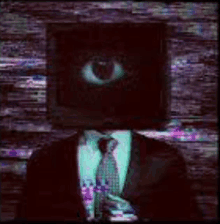 a man in a suit and tie has a computer monitor on his head with an eye on it .