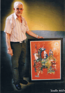 a man holding a framed painting that says studio nebia on it