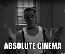 a black and white photo of a man with the words absolute cinema