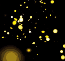 a black background with arabic writing and yellow spots