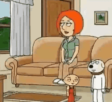 lois griffin is sitting on a couch in a living room with a dog .