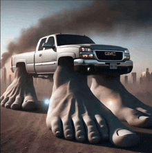 a gmc truck with giant feet on it