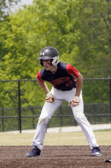 a baseball player wearing a jersey that says burlington on it