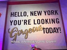 a poster that says hello new york you 're looking gorgeous today