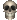 a pixelated skull on a white background with a blurred background .