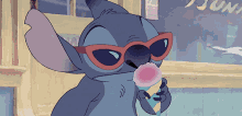 a cartoon character wearing sunglasses is eating ice cream