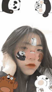 a girl with we bare bears on her face looks at the camera