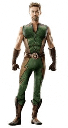 a man in a green and brown superhero costume is standing with his hands on his hips .