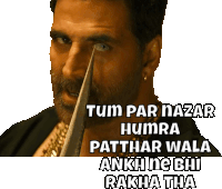 a man with a knife in his eye and the words tum par nazar humra patthar wala