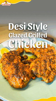 a plate of desi style glazed grilled chicken with a lemon wedge