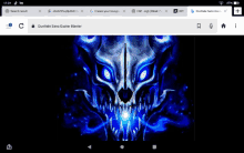 a computer screen shows a picture of a blue skull