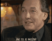 a close up of a man 's face with the words jak to je mozny written below him