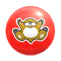 a red ball with a sticker of a beaver on it