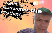 martin rearranges the equation poster with a man