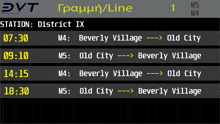 a digital screen displays the time and destination of the beverly village