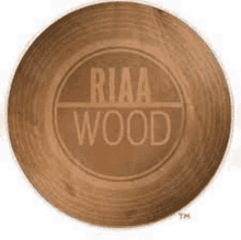 a wooden frisbee with the words riaa wood written on it